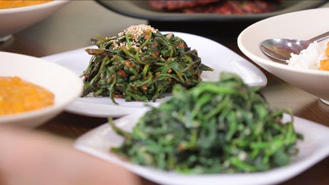 Green bell pepper leaf salad on the table