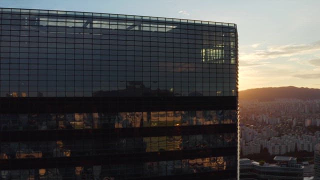 Sunset over a modern city skyline