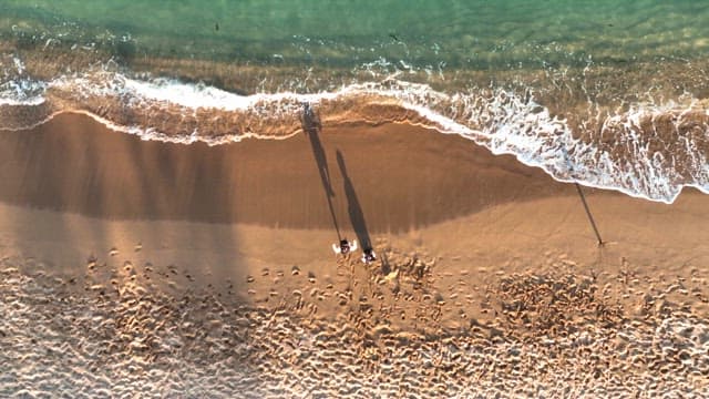 People having fun at a sandy beach