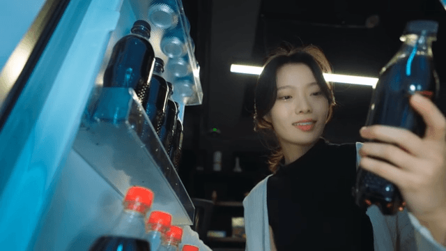 Person Taking Beverage Out from Fridge at Night