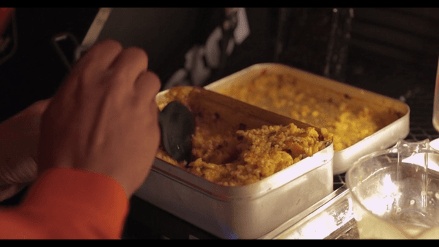 Person Enjoying a Meal in a Casual Setting