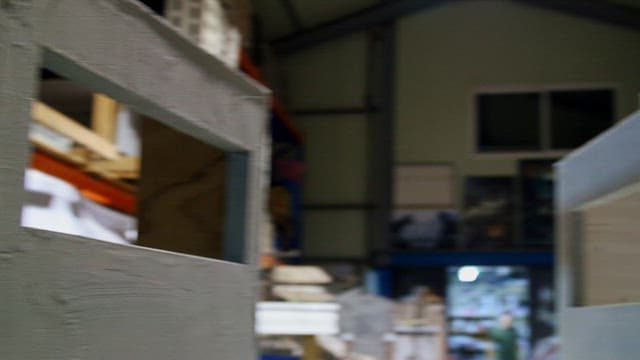 Elaborate miniature of an old house made of cement