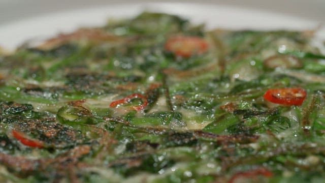 Crispy outer surface of freshly baked water parsley pancakes