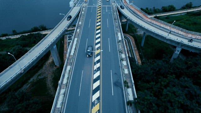 Vehicles Driving on a Bridge by the Han River