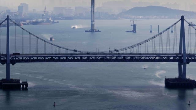 Large bridge over a calm river