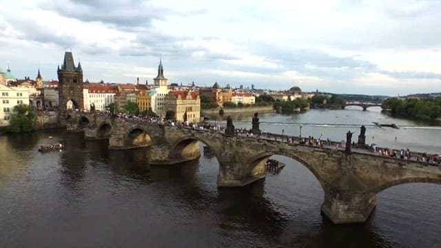 Aerial View of Crowded Historic Bridge Over River