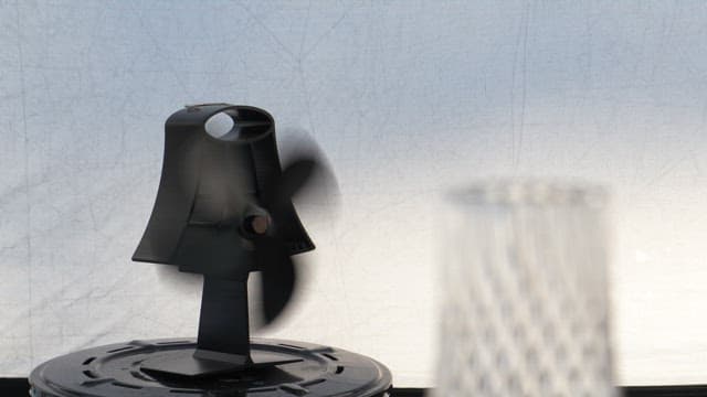 Black fan inside the tent