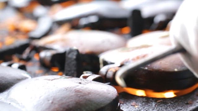 Korean fish-shaped pastry being cooked