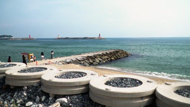 People enjoying a scenic beach view