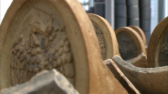 Elaborate traditional Korean roof tiles made in a workshop