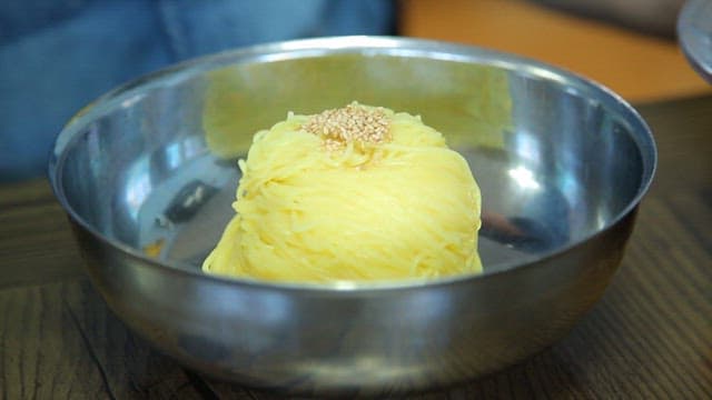 Cold noodles and spicy sauce in a bowl