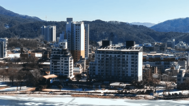 Cityscape Against Mountain on Clear Day