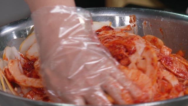 Fresh Korean Melons and Noodles Mixed with Red and Spicy Sauce