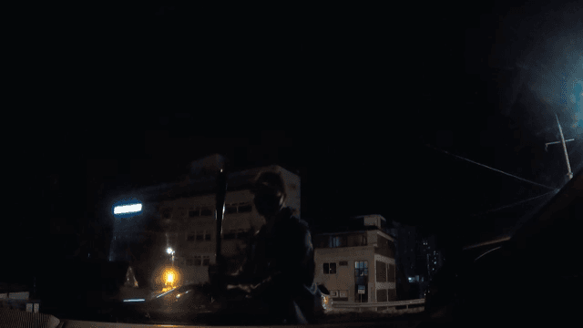 Man Hitting the Car window with a Bat at Night