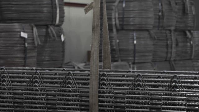 Metal springs being processed in a factory