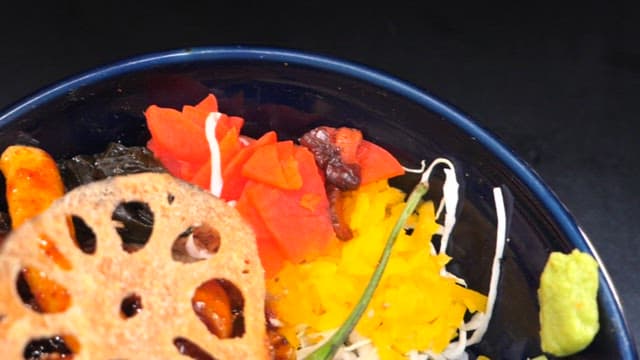 Appetizing tripe rice bowl with various ingredients