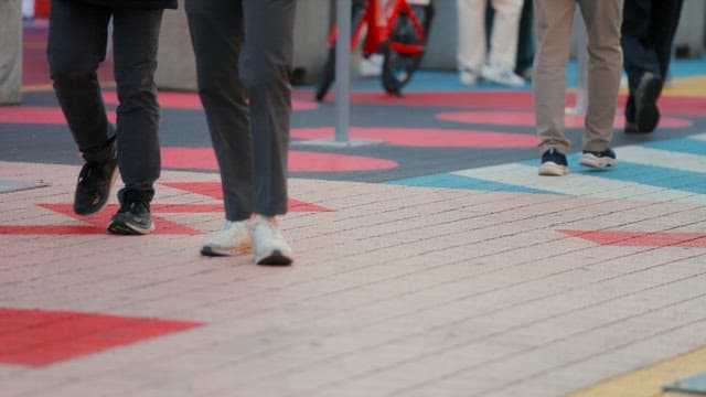 People walking on a colorful hongdae street