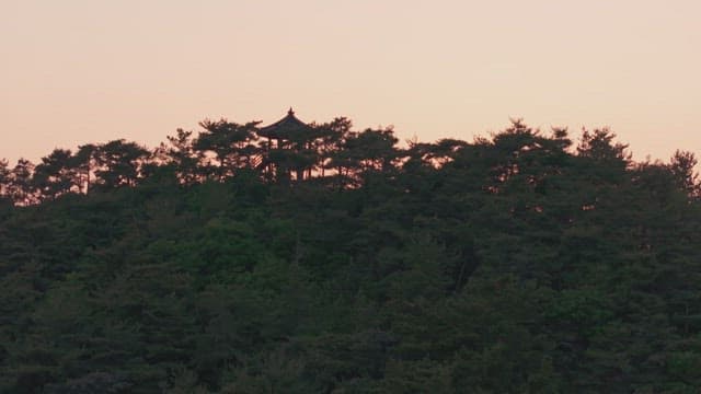 Sunset over a pavilion and sea