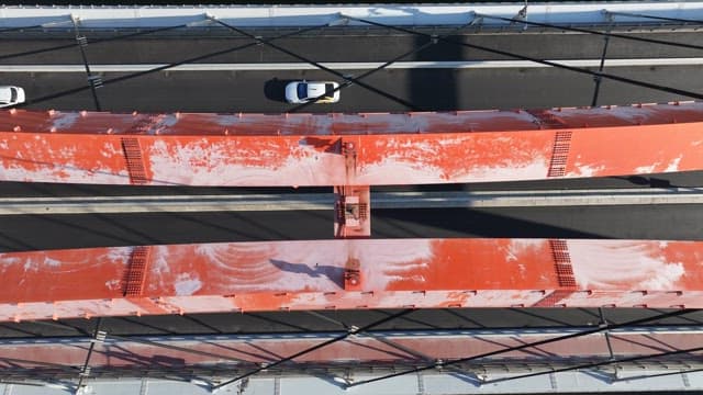 Vehicles Driving up a Road of Straight Bridge