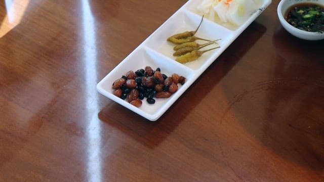 Fresh cold raw fish soup served on a restaurant table
