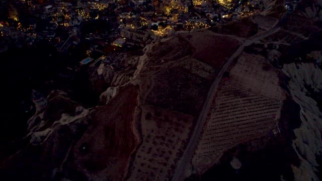 Illuminated Night View of the Historic Village at Dusk