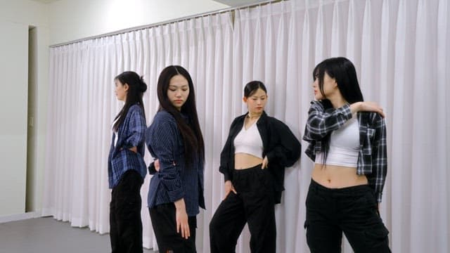 K-POP Dancers Practicing in a Studio
