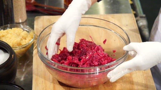 Mixing ingredients for Korean beef tartare