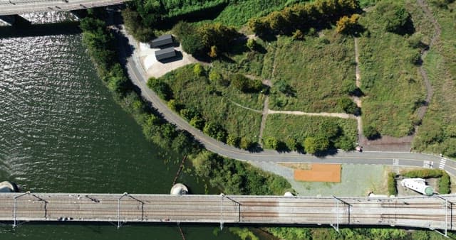 Sridge over a river with lush greenery