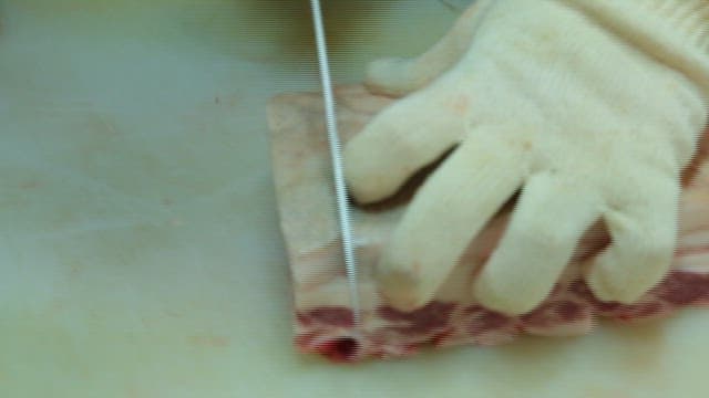 Hand Cutting Pork