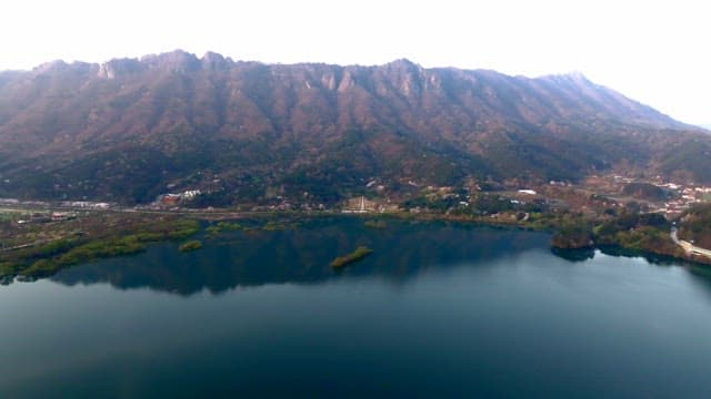 Mountain range with a serene lake view