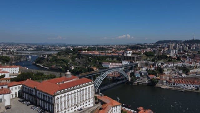 Cityscape with river and historical buildings on a bright sunny day