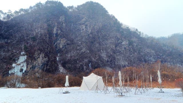 Wintry Mountain Landscape with Frozen Waterfall