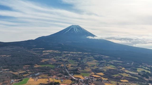 Majestic Mount Fuji with surrounding fields