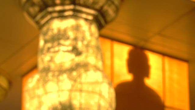 Large decorative lantern in the shape of a lit Haetae