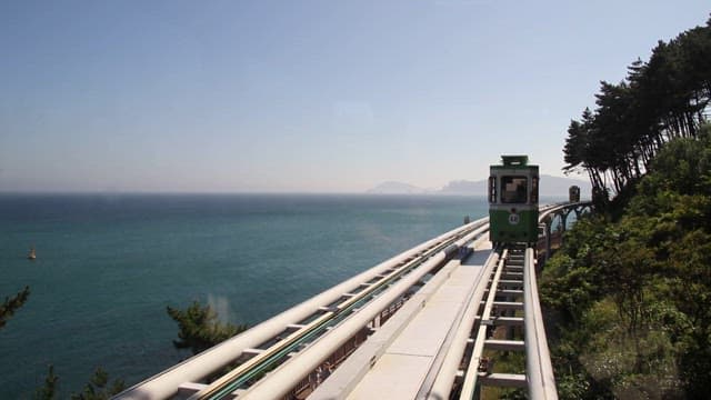 Scenic coastal train ride along the ocean