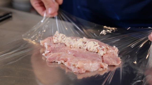 Chicken wrapped in sauce for wrapping