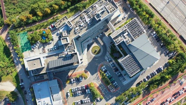 Panoramic view of the National Forensic Service building and parking lot