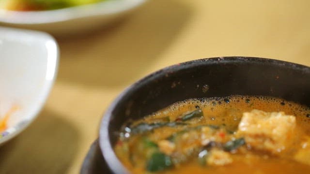 Korean soybean paste stew with freshwater snail in a pot