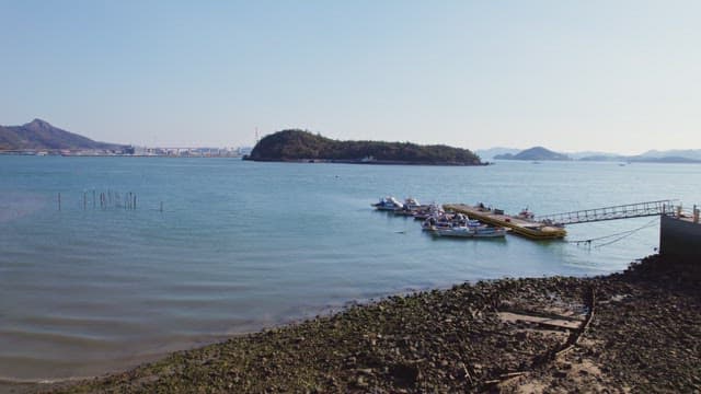 Calm sea with small islands and boats