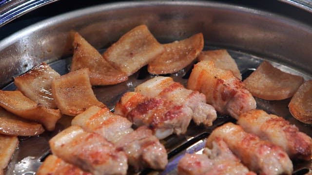 Pork belly and pork rinds grilled on the grill