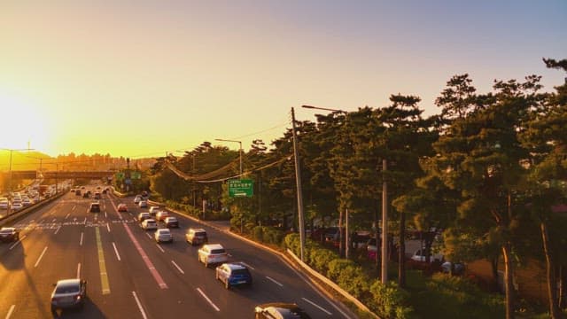 Sunset over a busy highway in the city