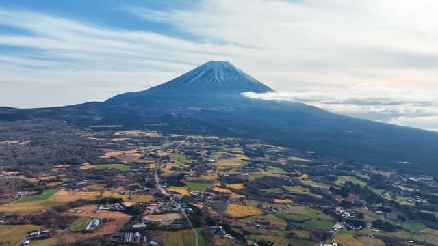 Majestic Mount Fuji with surrounding fields