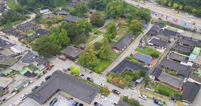 Traditional Korean village with lush greenery