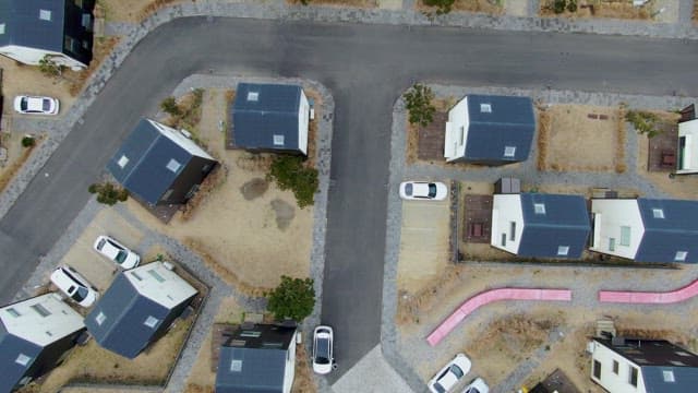Residential area surrounded by agricultural land