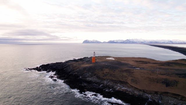 Lighthouse on a rocky coastal landscape