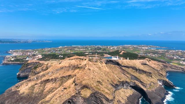 Scenic island surrounded by blue sea