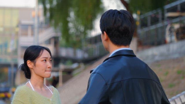 Couple arguing outdoors