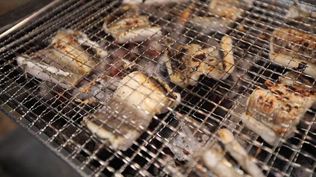Sea eel grilled until golden brown on a barbecue grill