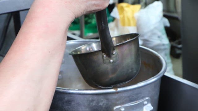 Preparing Hot Sundae Soup in a Kitchen