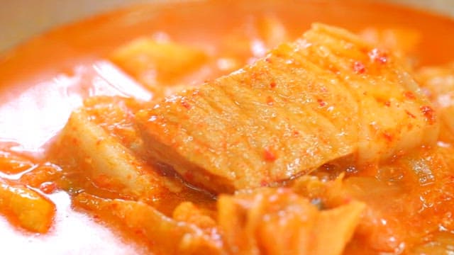 Spoon of Delicious Pork Kimchi Stew